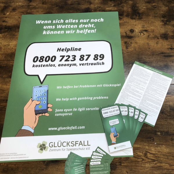 Spielerschutz‑Material – Informationspaket für Prävention und Unterstützung Spielerschutz‑Material mit Infoflyern, Plakaten und einer Helpline‑Nummer für Personen mit Glücksspielproblemen